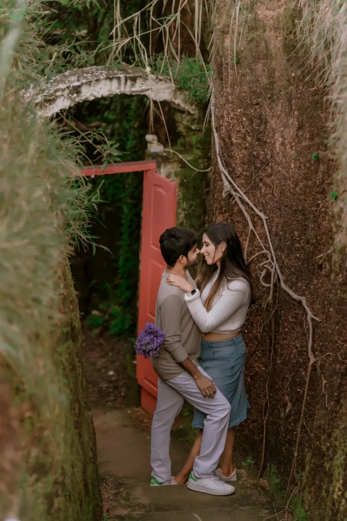 Smiling couple by the beautiful cliff at Varkala