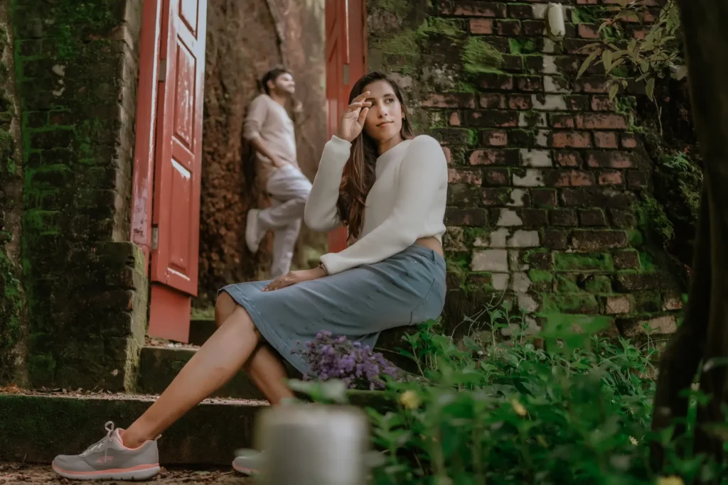 Engaged couple embracing near Varkala cliff pre wedding