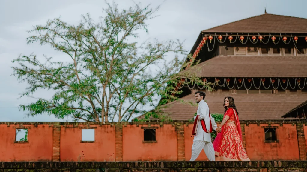 couple walking on photoshoot at trivandrum wedding